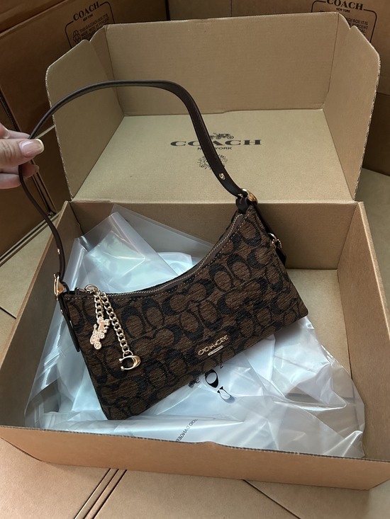 Coach Handbags - Coach brown floral print crossbody bag